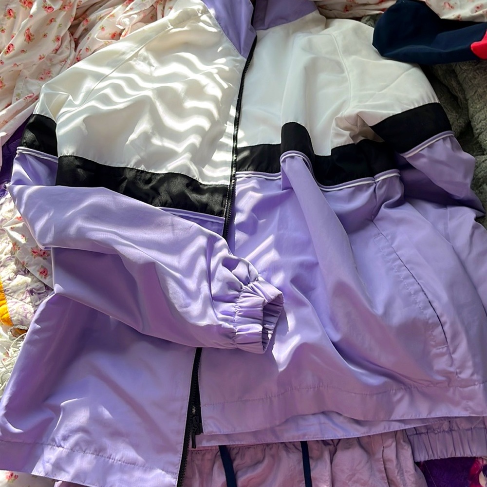 Step into the 90s in a lavender haze with this lavender vintage stripe raincoat